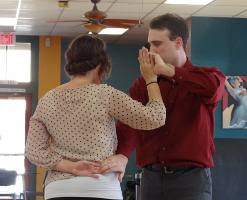 Man and woman country dancing