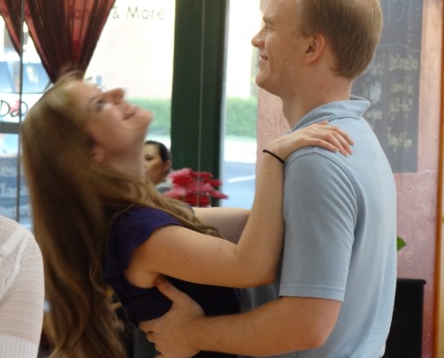 Wedding couple learning first dance