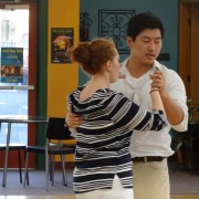 Teacher and student dancing