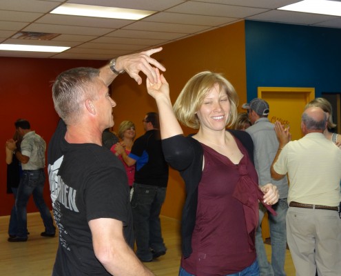 a couple country dancing