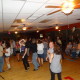 A group of people country dancing